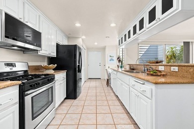 Located within the gated community of Seawind Cove, this - photo 14