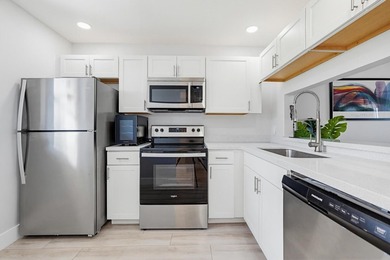 Welcome to this beautifully renovated 2BR/2BA condo in the - photo 3