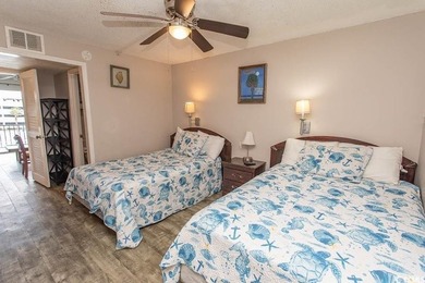 Step into beachside living with this charming one-bedroom condo - photo 3