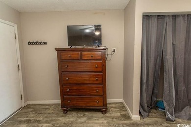 Step into beachside living with this charming one-bedroom condo - photo 5