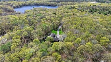 Nestled amidst nearly 500 acres of protected preserve land, this - photo 2