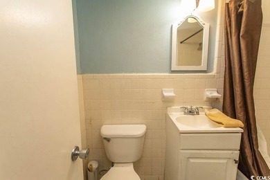 Step into beachside living with this charming one-bedroom condo - photo 8