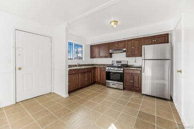 2084 Davidson Ave is a well maintained two family brick home in - photo 10