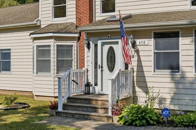 Completely remodeled and expanded, this beautifully maintained - photo 2