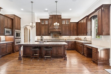 Experience timeless elegance in this exceptional custom estate - photo 9