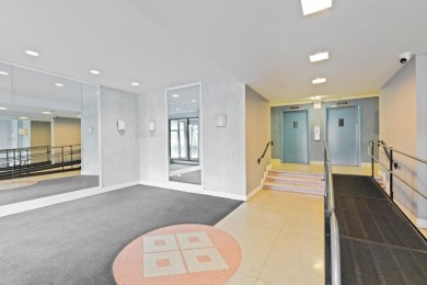 Enjoy easy living in this well-maintained 9th-floor condo at