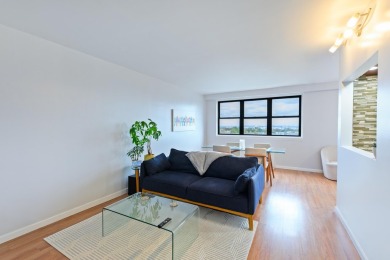 Enjoy easy living in this well-maintained 9th-floor condo at