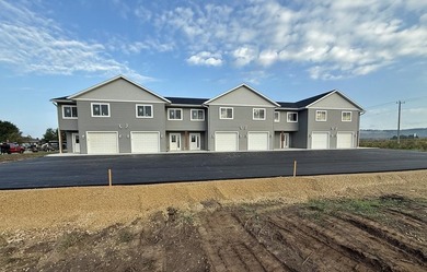 Income~producing 6~unit multifamily property with a balanced - photo 1