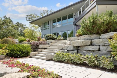 This stunning ranch home, designed by James R. Dresser in the - photo 16