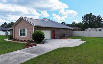Welcome home to this beautiful, move-in-ready brick home located - photo 36