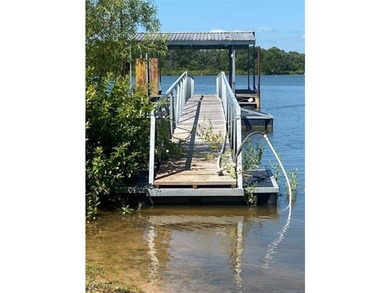 Newly Remodeled home with a 1 slip boat dock with electricity in - photo 22