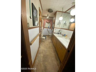 1 Acre pond on Property with a water well to control water level