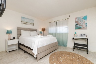 Wake up to shimmering coastal breezes in this beautifully - photo 22