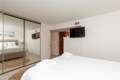 Wake up to shimmering coastal breezes in this beautifully - photo 24