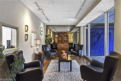 Enjoy effortless high-rise living in this 10th-floor condo at - photo 3