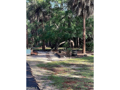 Experience the rare combination of 2.28 acres on a freshwater - photo 8