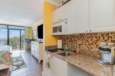Direct Oceanfront remodeled Studio with a unique stone wall. The - photo 18