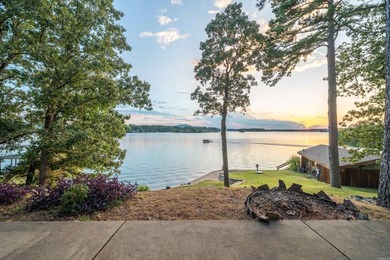 Step through the gated entry to a private, lakeside estate on - photo 12