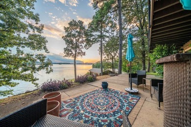 Step through the gated entry to a private, lakeside estate on - photo 13