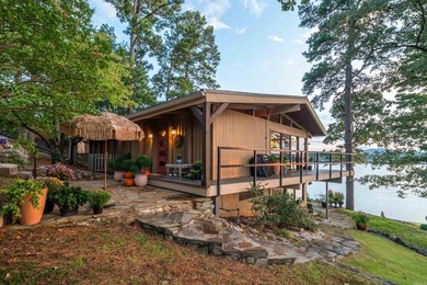 Step through the gated entry to a private, lakeside estate on - photo 17
