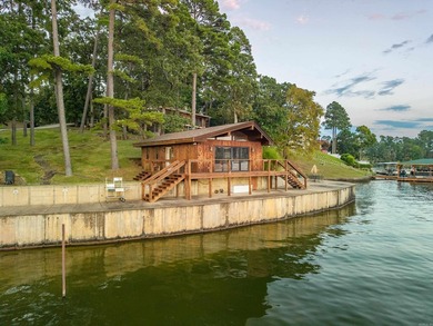Step through the gated entry to a private, lakeside estate on - photo 33