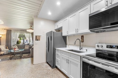 Welcome to this charming single-story residence This - photo 4