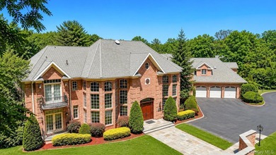 Exceptional brick estate offering 9,023 sq ft of refined living - photo 2