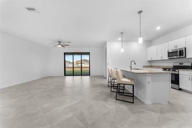 One or more photo(s) has been virtually staged. This home offers - photo 3