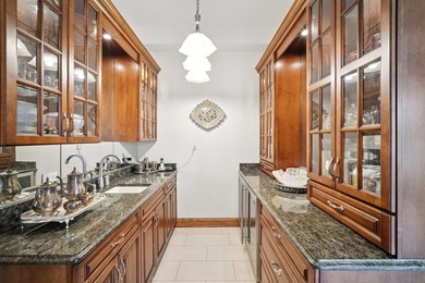 Nestled on over an acre of serene, private grounds in - photo 11