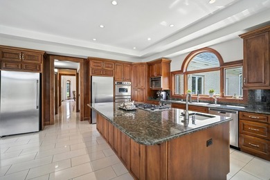 Nestled on over an acre of serene, private grounds in - photo 15