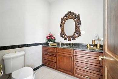 Nestled on over an acre of serene, private grounds in - photo 20