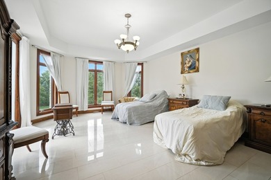 Nestled on over an acre of serene, private grounds in - photo 21