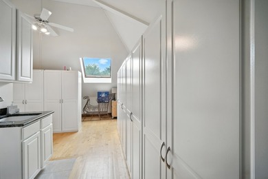 Nestled on over an acre of serene, private grounds in - photo 22