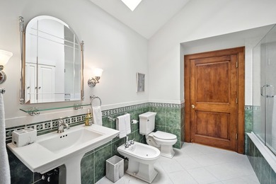 Nestled on over an acre of serene, private grounds in - photo 23