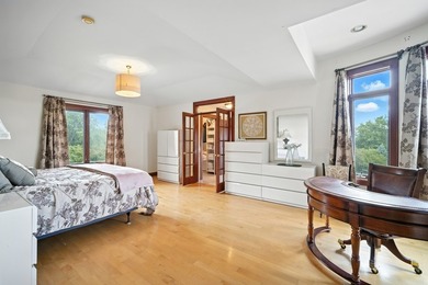 Nestled on over an acre of serene, private grounds in - photo 26