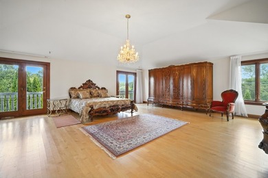 Nestled on over an acre of serene, private grounds in - photo 30