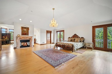Nestled on over an acre of serene, private grounds in - photo 31