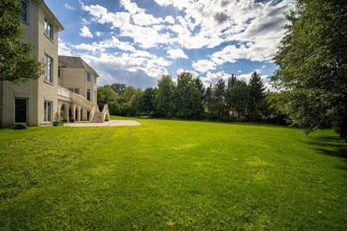 Nestled on over an acre of serene, private grounds in - photo 36