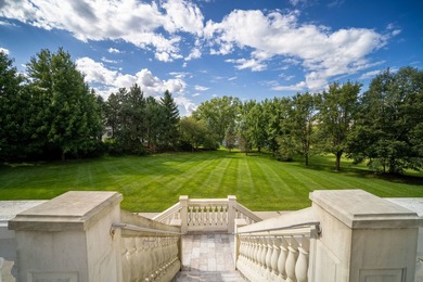 Nestled on over an acre of serene, private grounds in - photo 39