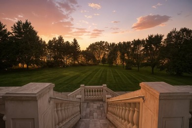 Nestled on over an acre of serene, private grounds in - photo 45