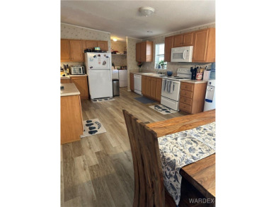 Exceptional home in Arrowhead Ranch in 55+ community. Split