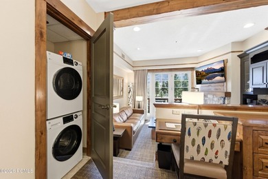 Perched on the top floor, this beautifully updated executive - photo 11