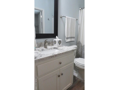 This beautiful 3-bedroom, 3-bathroom brick patio home is only - photo 27