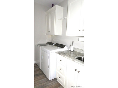 This beautiful 3-bedroom, 3-bathroom brick patio home is only - photo 31