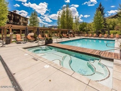 Perched on the top floor, this beautifully updated executive - photo 32