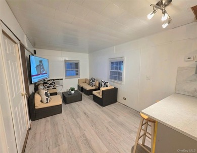This charming 2-bedroom, 1-bath mobile home is located in a - photo 12