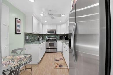 Spacious 1BR/1.5BA condo featuring the largest one-bedroom floor - photo 8