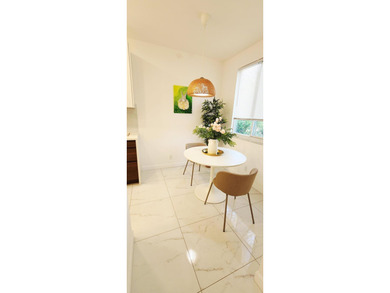 Fully renovated, bright and modern two-story home in the heart - photo 7