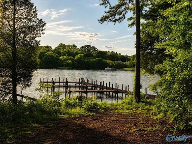 Build your dream home on this 0.72+/- acre waterfront lot in - photo 5