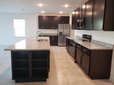 Lowest priced 4 bedroom home in Crosstown Commons. Upgraded - photo 6